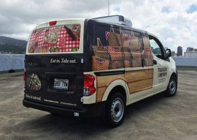 tucker & bevvy van decorated with a full body custom commercial vinyl wrap