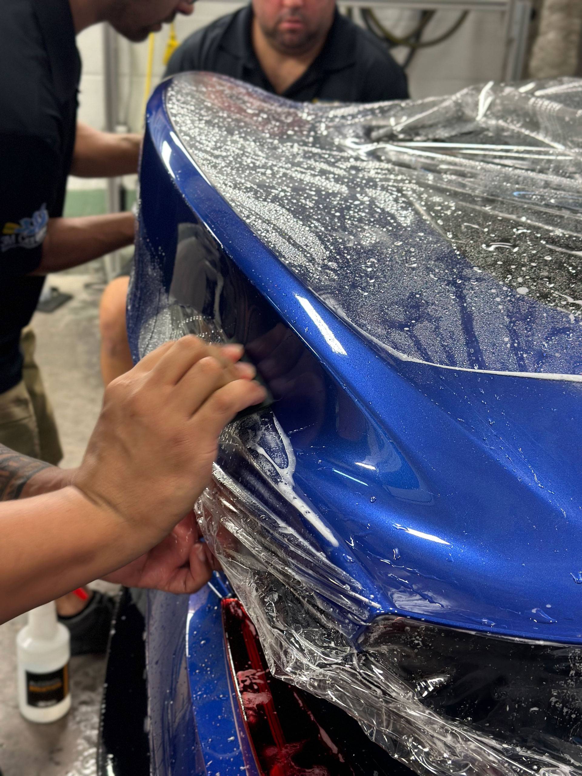 close up of white Nissan Z with ceramic coating