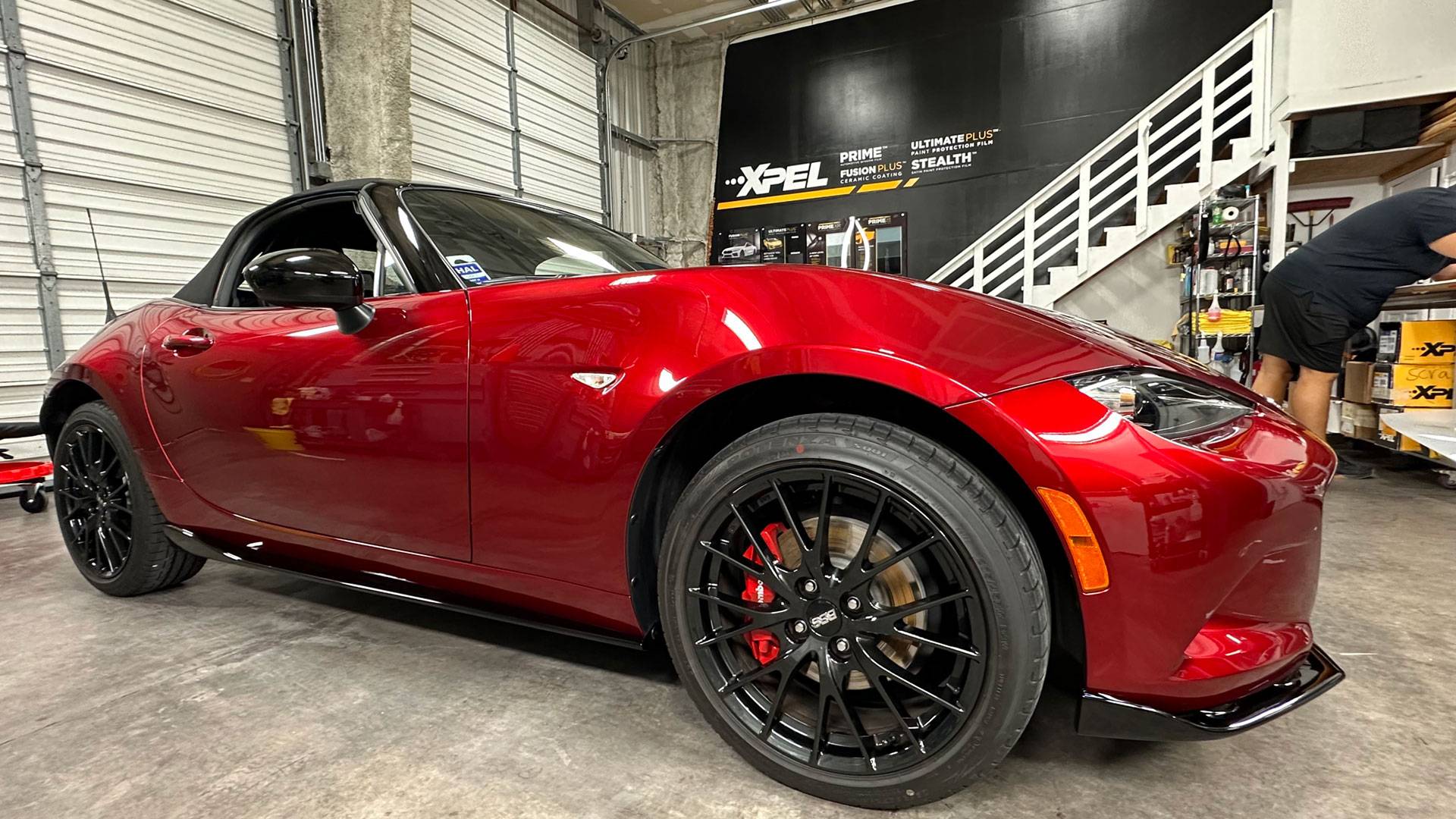 close up of white Nissan Z with ceramic coating