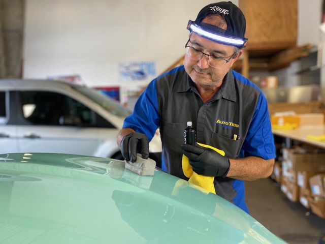 man putting on ceramic coating
